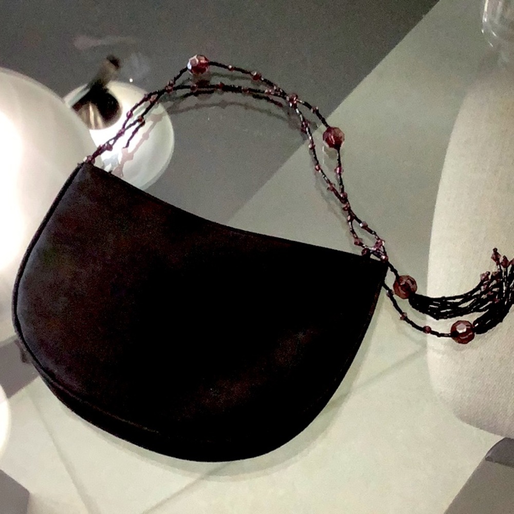 Small black evening bag.